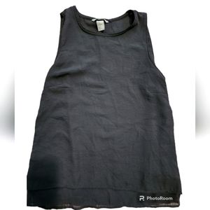 H&M Woman Navy Sleeveless sheer lined top.